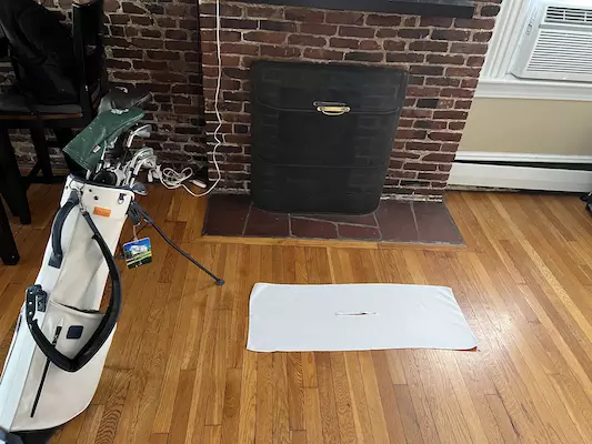 Place a towel on the ground so you can lay the damp grips down after cleaning